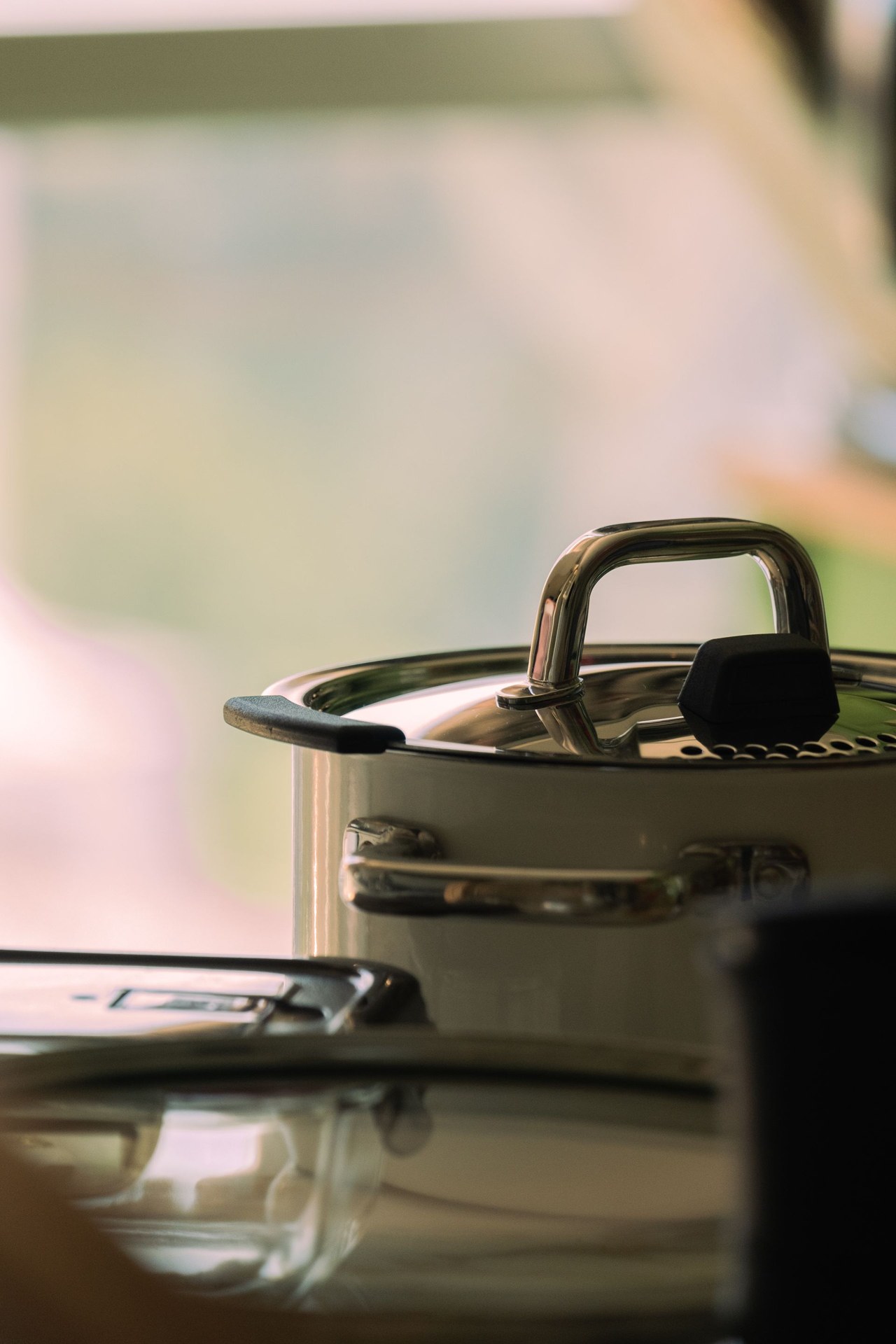 Close-up of mirror-polished stainless steel stockpot interior